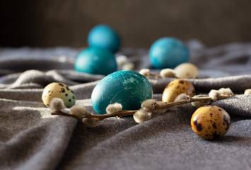 Blue marble Easter eggs painted by natural dyes. Branches of willow, symbol of Orthodox Easter. Horizotal orientation