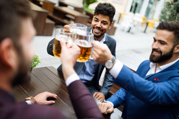 People, men, leisure, friendship and celebration concept