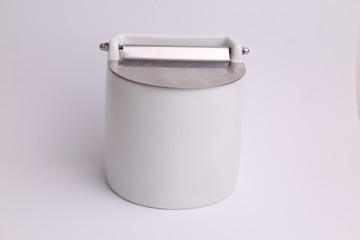 White ceramic salt shaker in color background