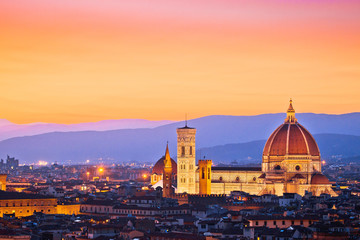 Colorful Florence rooftops and Duomo view at sunset