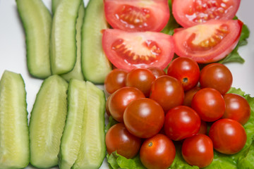 Cucumbers sliced tomatoes and lettuce
