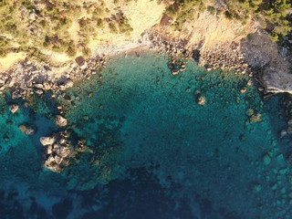 aerial view of the sea and  coast of mallorca with tourquise calm water of the island of mallorca