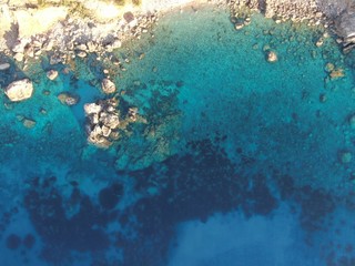 aerial view of the sea and  coast of mallorca with tourquise calm water of the island of mallorca