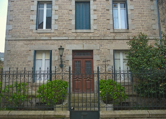 Naklejka premium Traditional french stone building with many windows