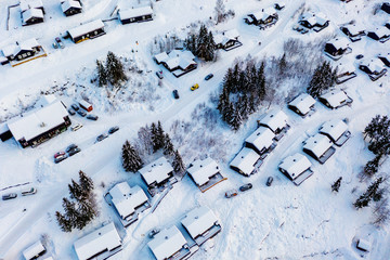 Aerial view of ski resort Hafjell in Norway with houses in winter