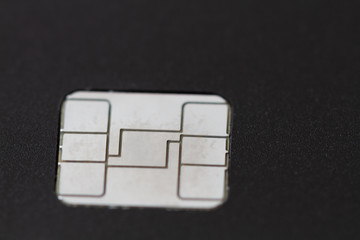 Black credit card chip of macro