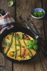 Frittata. Italian omelet with asparagus and bell pepper
