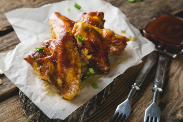 Fried chicken wings with barbecue sauce