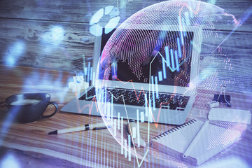 Multi exposure of graph and financial info and work space with computer background. Concept of...