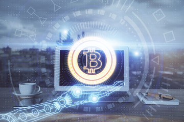Double exposure of blockchain theme hologram and table with computer background. Concept of bitcoin...
