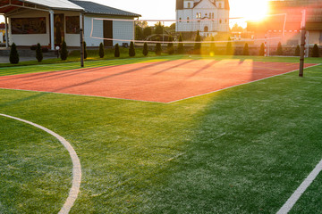 Outdoors mini football court with artificial turf.