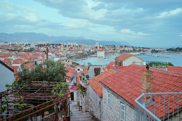 Fototapeta na wymiar Beautiful cityscape with red tiled roofs of Split old town, Croatia.
