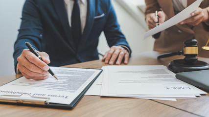 Lawsuit and justice concept, Lawyer  working with partner at law firm. legal consulting discussion defendant punishment law in courtroom