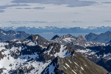 View about the mountains of the Lofoten from top of the hill matmora