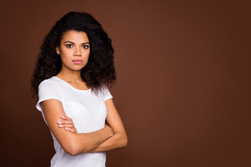 Turned photo of strict serious afro american girl cross hands ready decide decision solution wear casual style outfit isolated over brown color background