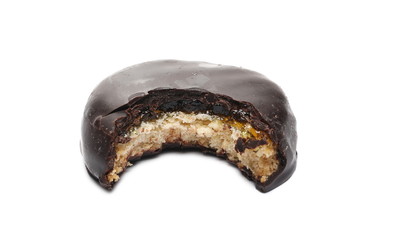 Chocolate honey cake with bite mark, chunk taken out, isolated on white background