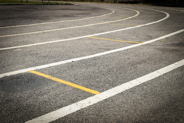 black tarmac asphalt of running track, athletic sport background