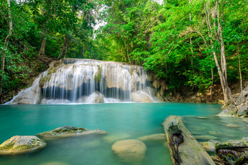 Fototapeta na wymiar Waterfall in Tropical forest at Erawan waterfall National Park, Thailand