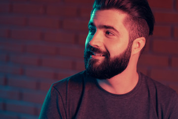 Fototapeta premium Cheerful young man in a nightclub