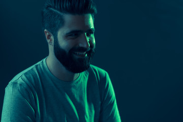 Neon portrait of a young attractive man