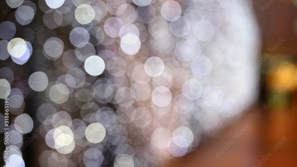 Wall mural Blurred circle bokeh background with christmas lights