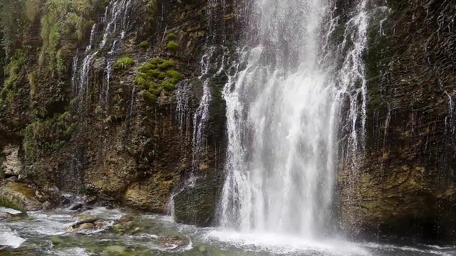 Slow motion movement of water in the waterfall