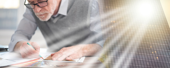 Architect working on a project; multiple exposure