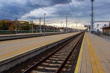 Fototapeta premium Dimitrovgrad, Haskovo Province Bulgaria railway station platforms under dramatic sky