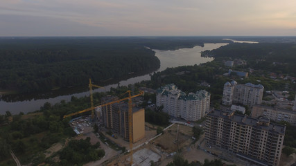Aerial view construction site with crane at building background