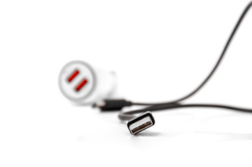 Charger for car close-up on white background.