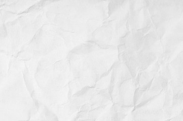 background of an old crumpled sheet of paper, top view, paper texture
