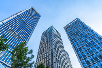 Obraz na płótnie Canvas Perspective view of contemporary glass building skyscraper