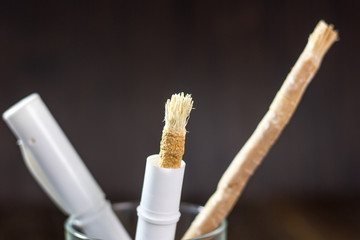Miswak or siwak in a glass.