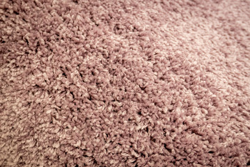 Close up view of carpet. Wall-to-wall carpeting background.