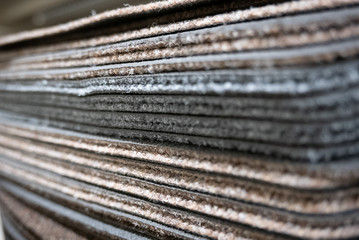 Fototapeta premium Pile of car mats in a fabric shop