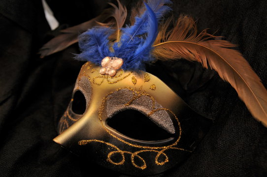 venetian carnival mask on black background