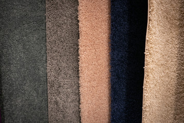 Lot of different carpets in a construction mall