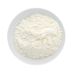 Fototapeta na wymiar Organic flour in bowl isolated on white, top view