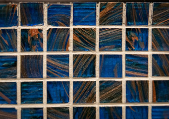 Blue ceramic mosaic on the wall as background