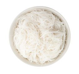 Bowl with rice noodles isolated on white, top view