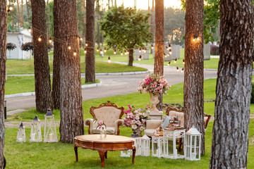 Luxurious photo zone on the green lawn. A place for beautiful pictures at wedding, birthday. Relax reception zone
