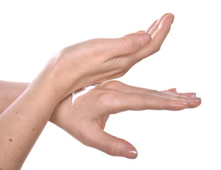 Closeup shot of beautiful female hands  applying moisturiser