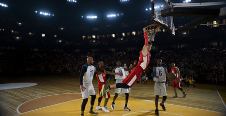 Basketball players on big professional arena during the game. Tense moment of the game.
