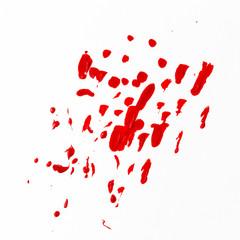 strokes and drops of red paint