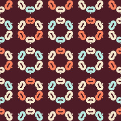 Seamless pattern with circular groups of geometric elements.