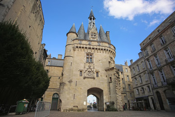 Fototapeta na wymiar The door or gate Porte Cailhau is beautiful gothic architecture from the 15th century. It is both a defensive gate and triumphal arch. Bordeaux, France.