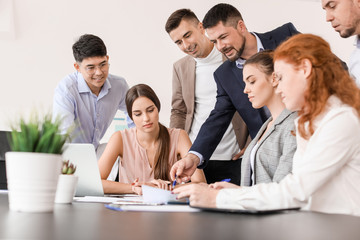 Group of business people during meeting in office