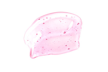 Beautiful pink transparent gel smear of hyaluronic acid on a white background isolated. Face serum is smudged. Products for makeup and skin care. Organic cosmetics. Cosmetology. Closeup.