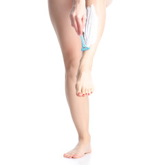 Female legs shaving foam razor on white background isolation