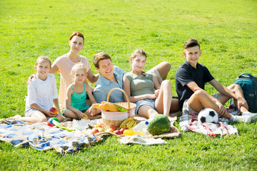 Family having picnic together